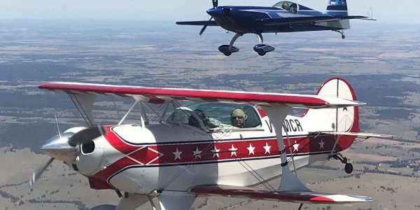 AAA Pitts Special and Extra aerobatic aircraft in formation
